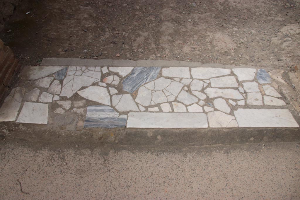 II.2 Herculaneum, May 2024.
Looking south across threshold from entrance room, leading to peristyle in north-east corner. Photo courtesy of Klaus Heese.